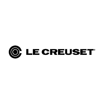 Le Creuset logo featuring black text and concentric circle design, representing premium cookware brand identity.